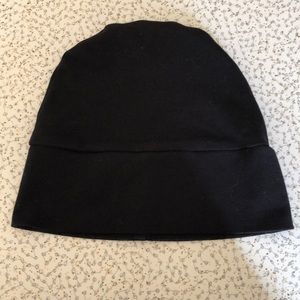 Black head covering by Cardani